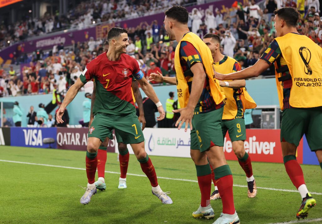 Cristiano Ronaldo celebrating for Portugal vs Ghana after becoming first player to score at five World Cups. 