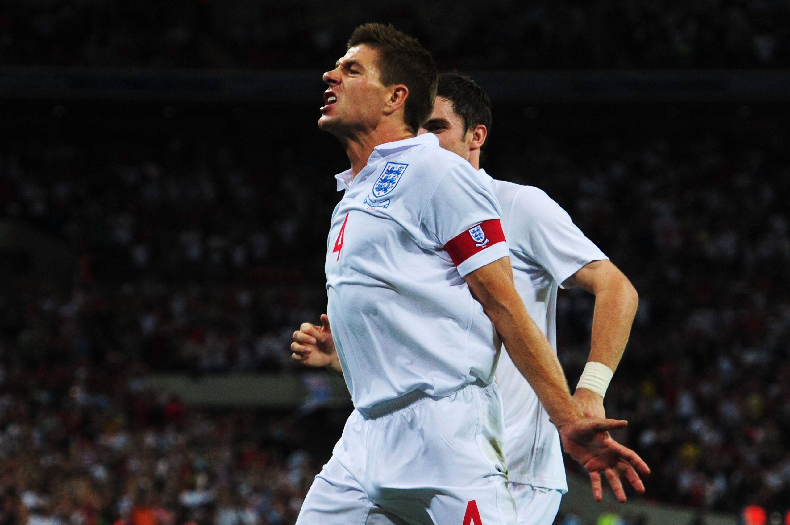 Gerrard celebrates scoring for England.