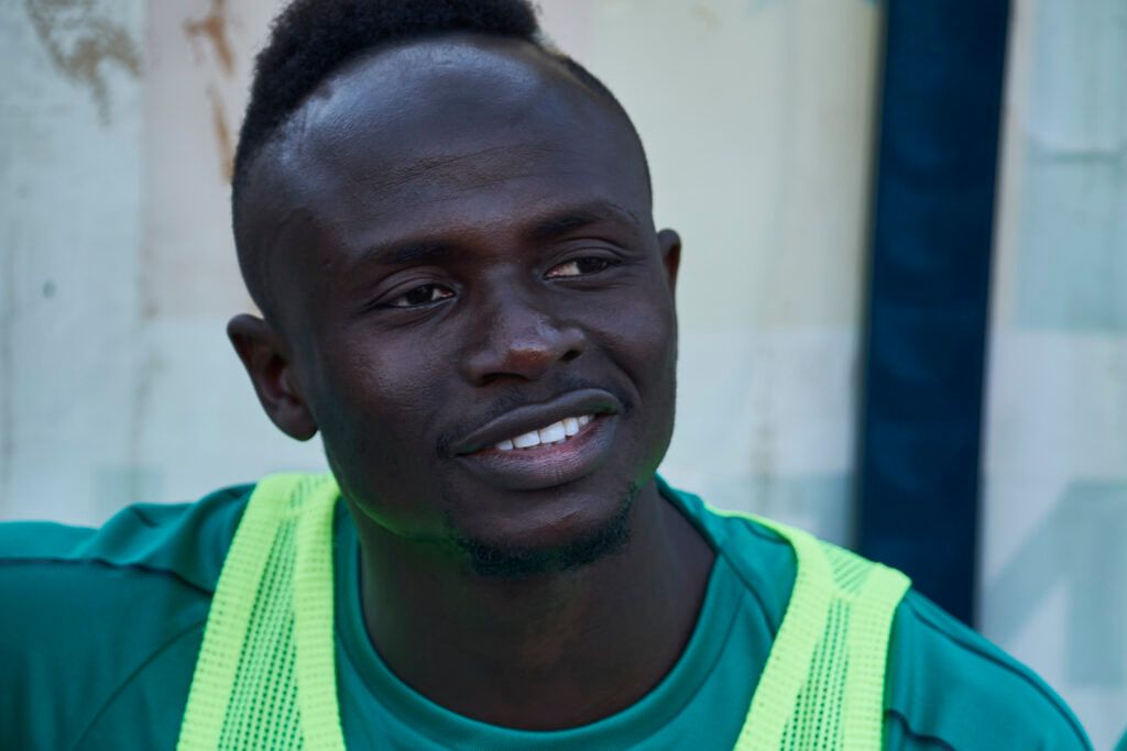 Sadio Mane looks on as he sits in the bench ahead of a friendly match between Senegal and Mali 
