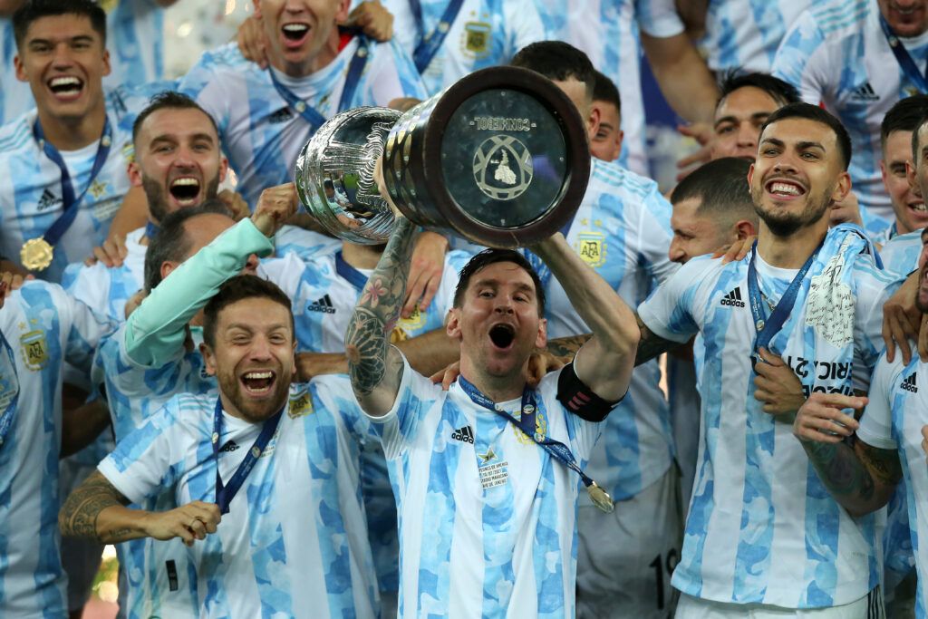Lionel Messi lifts the Copa America trophy