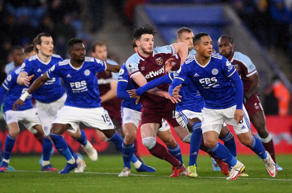 Declan Rice of West Ham United battles for position at a corner with Youri Tielemans of Leicester City