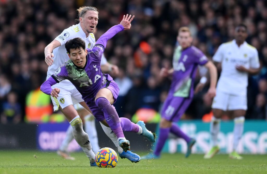 Heung-Min Son of Tottenham Hotspur is challenged by Luke Ayling of Leeds United