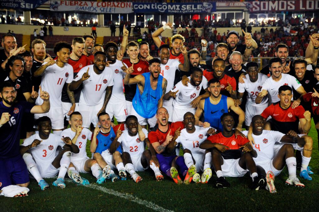 Players of Canada and staff members celebrate qualifying to Qatar 2022 after a match between Panama and Canada as part of Concacaf 2022 FIFA World Cup Qualifiers at Rommel Fernandez Stadium on March 30, 2022 in Ciudad de Panama, Panama