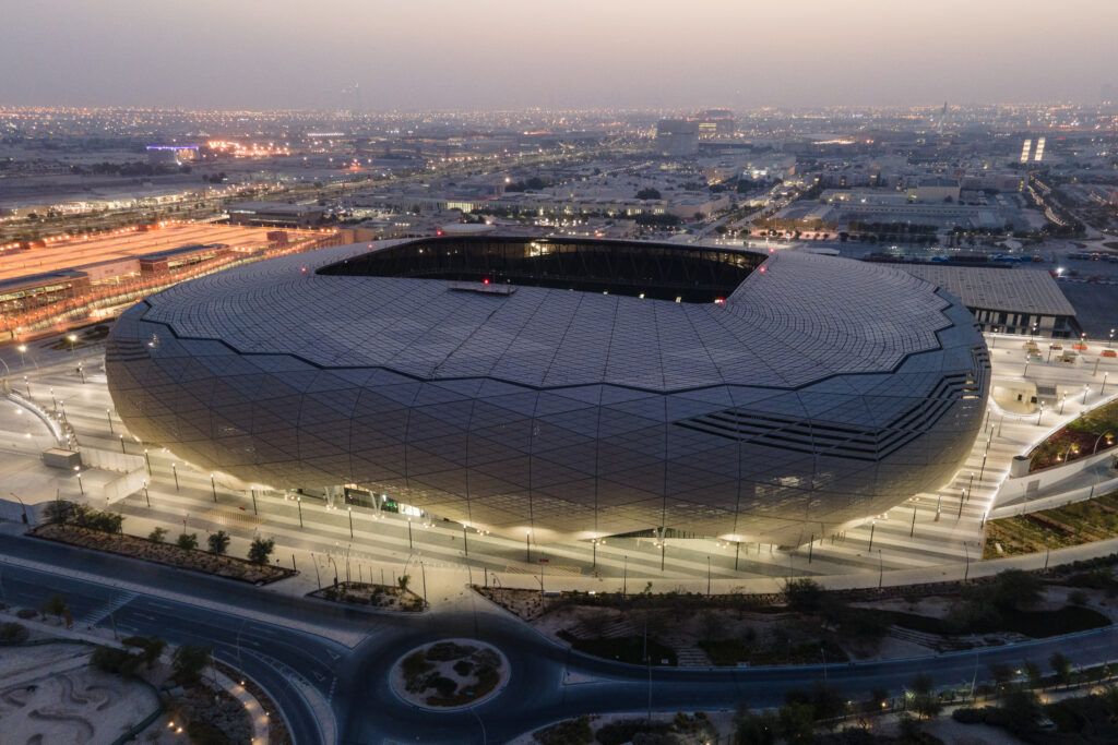 An aerial view of Education City stadium at sunrise