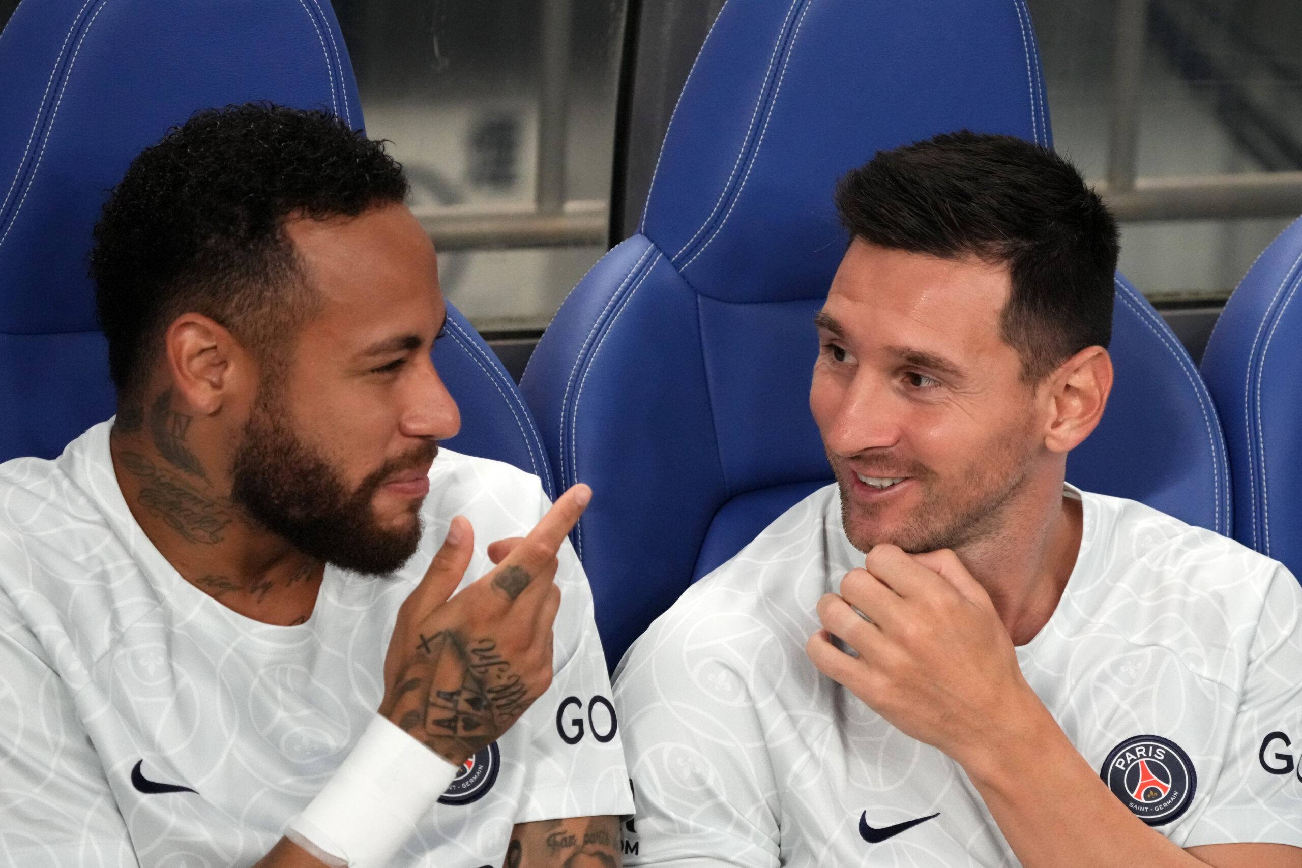 Neymar and Lionel Messi on the Paris Saint-Germain bench