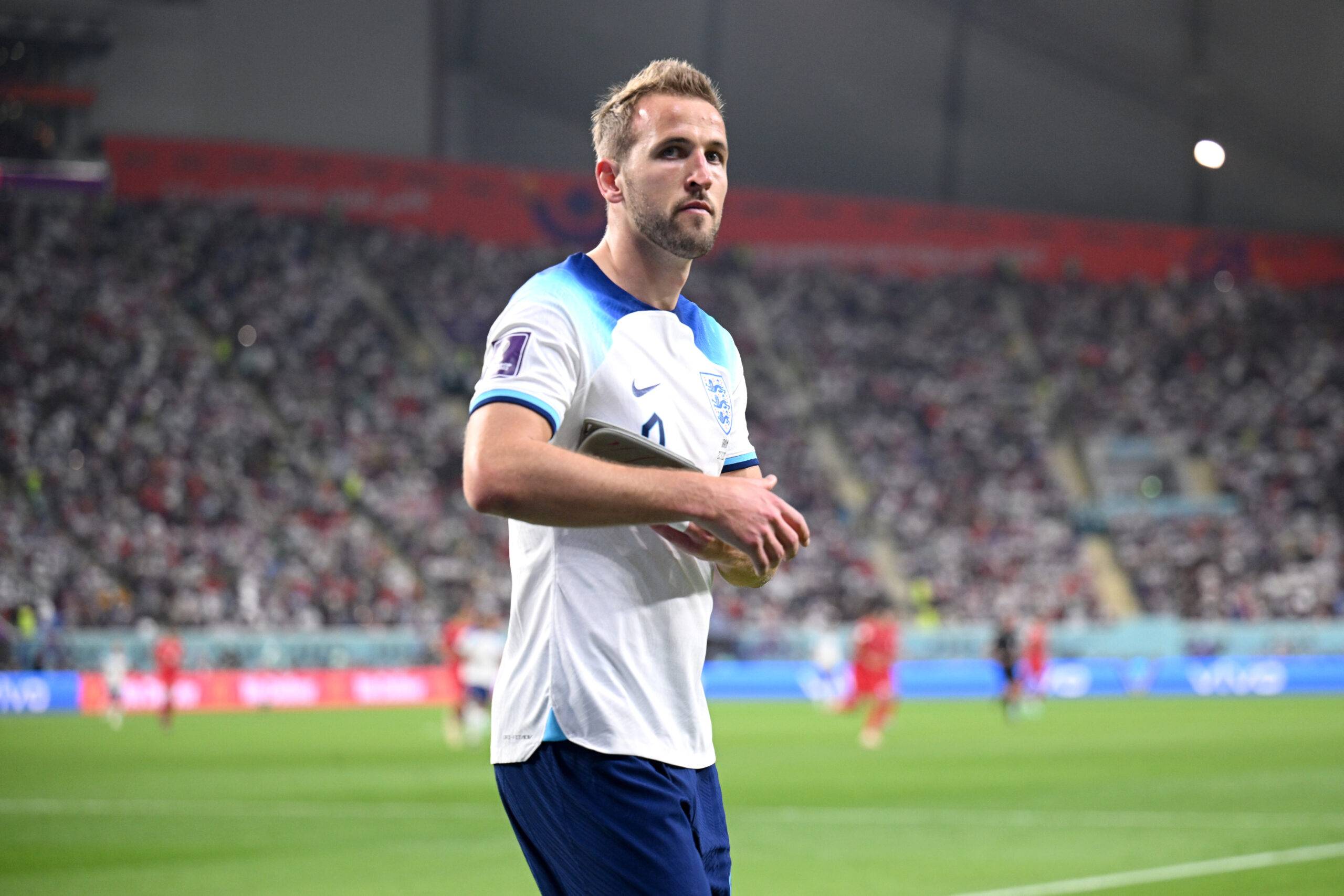 Harry Kane walks off the pitch during England 6-2 Iran