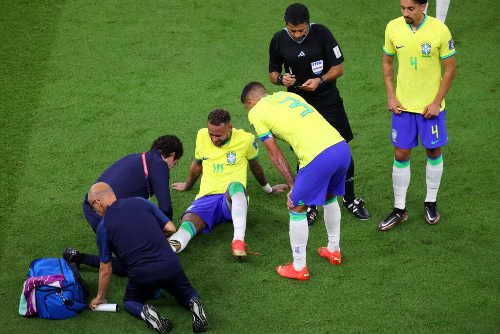 Neymar on the floor injured during Brazil vs Serbia