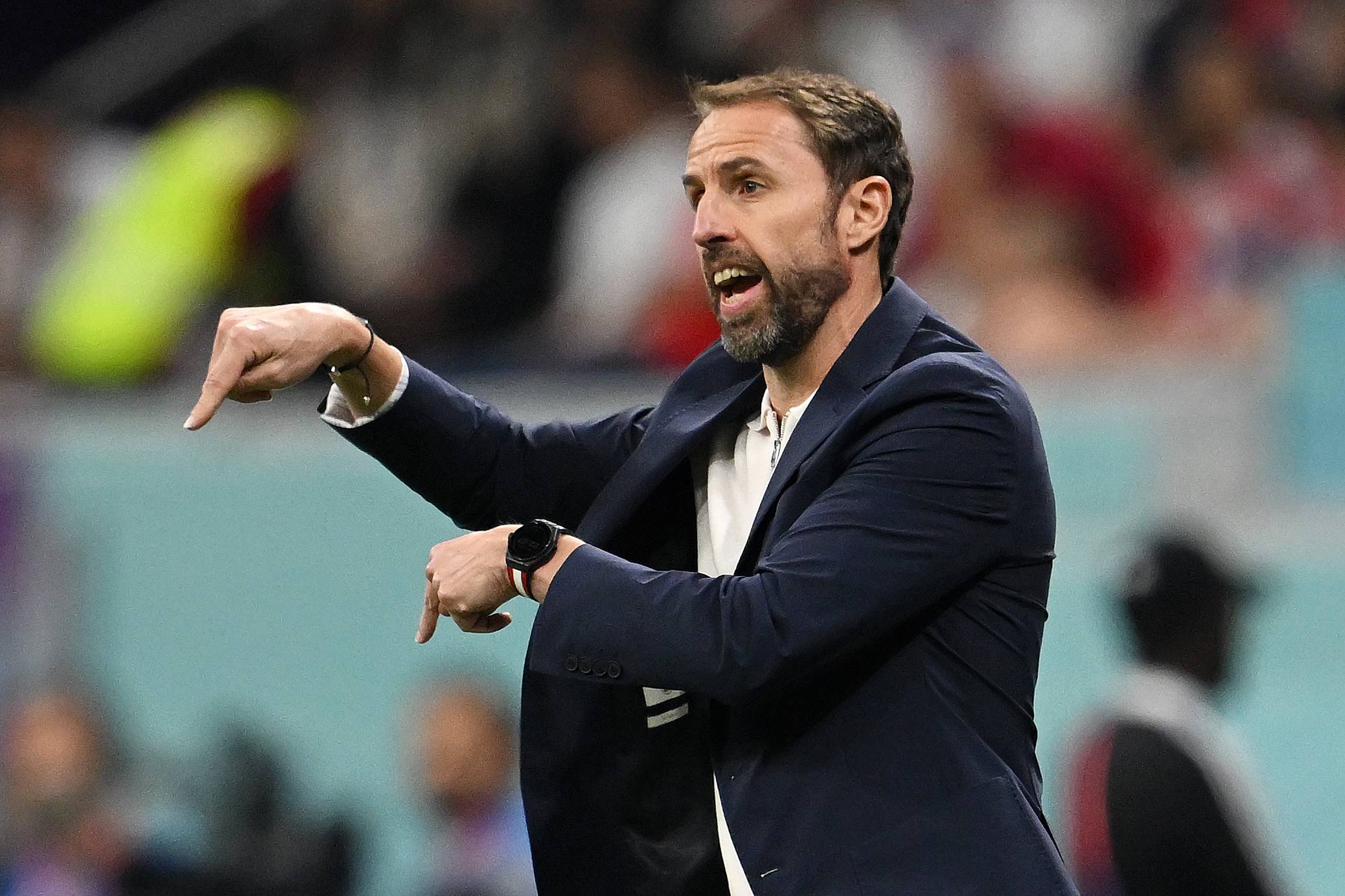 England's Southgate gives tactical instructions.