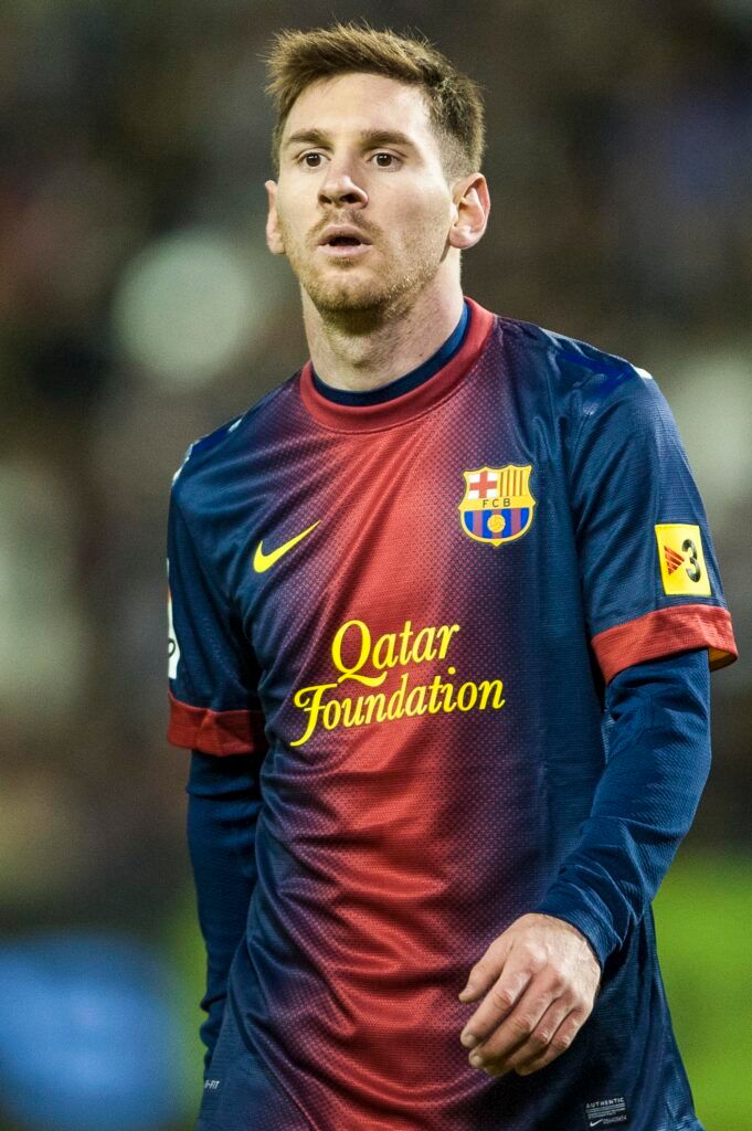 Messi playing for Barcelona in his iconic 2012.