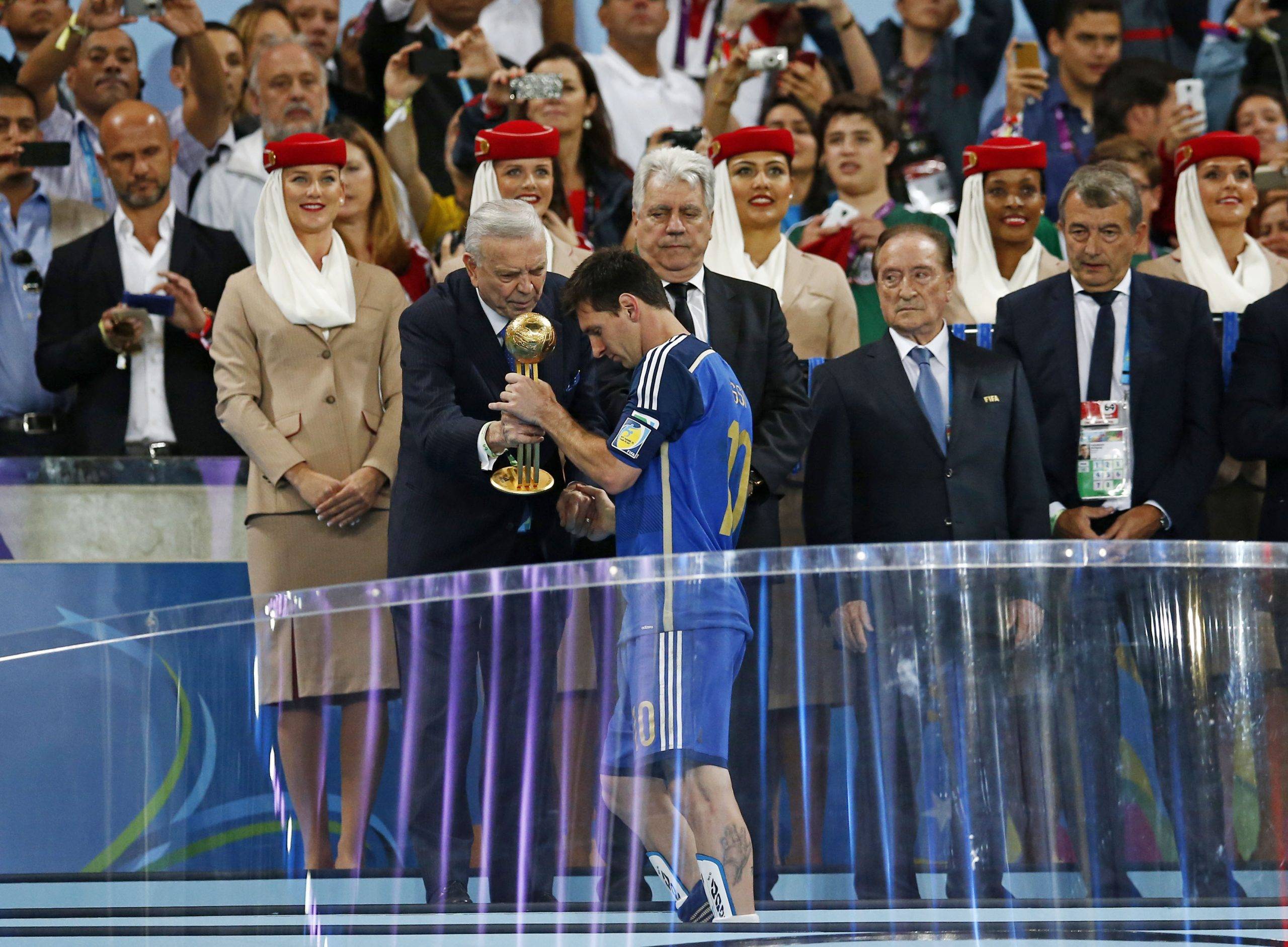 Messi collects the Golden Ball in 2014.
