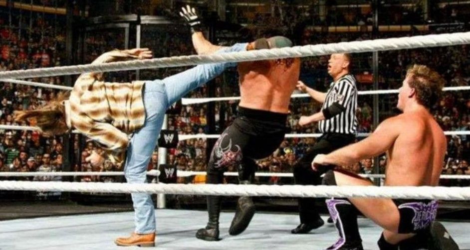 Shawn Michaels superkicks The Undertaker at Elimination Chamber 2010
