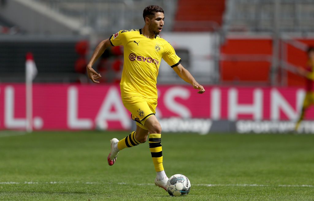 Achraf Hakimi runs with the ball for Borussia Dortmund